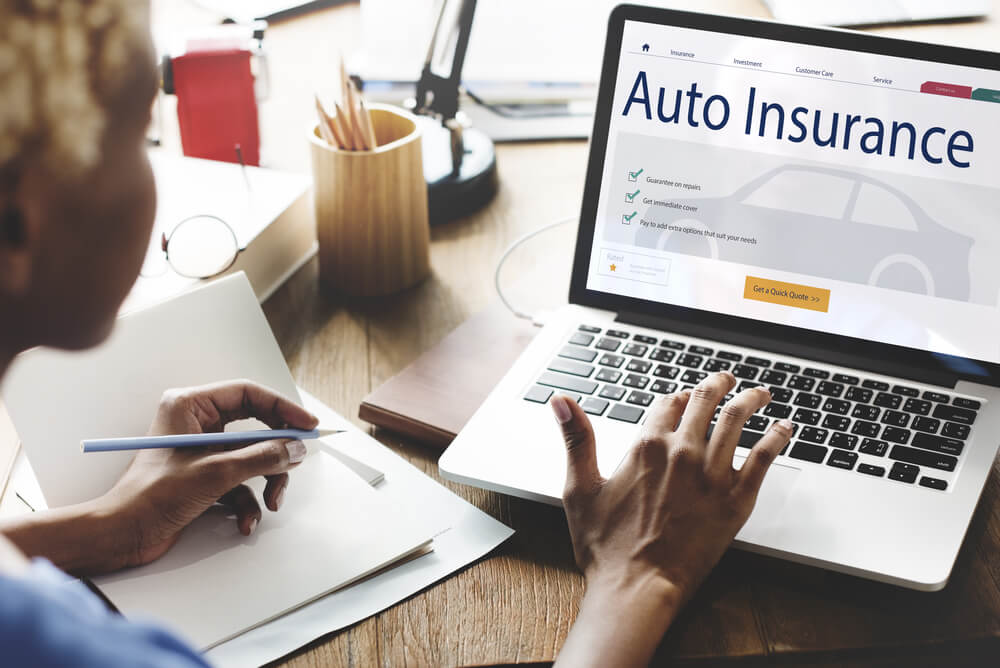 The Benefits Of Ing Car Insurance Freeway Woman Using Laptop To Request A Car Insurance Quote From Website